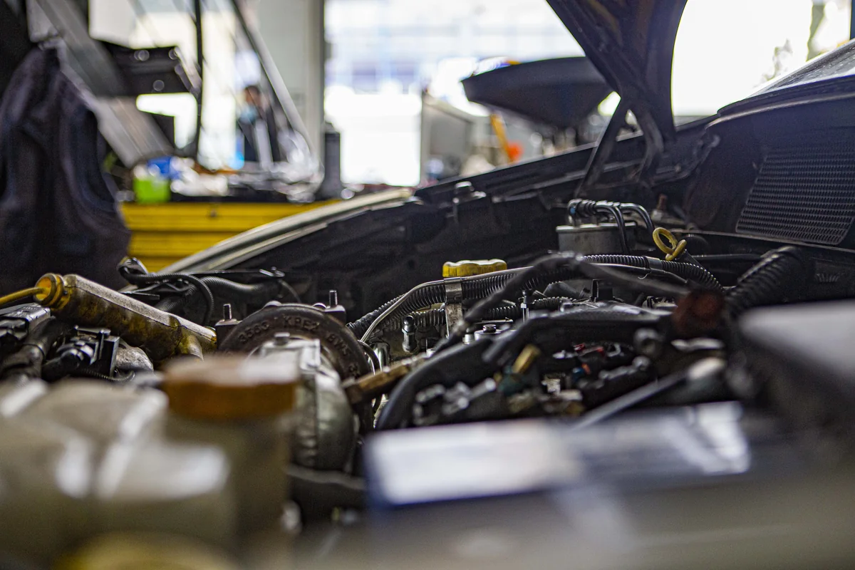 Open engine bay during maintenance at the workshop